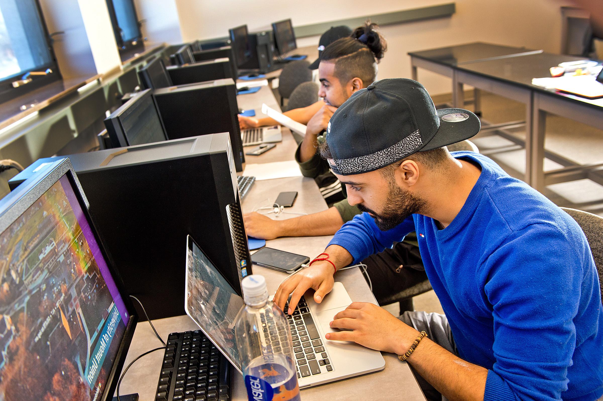 students doing work on computers